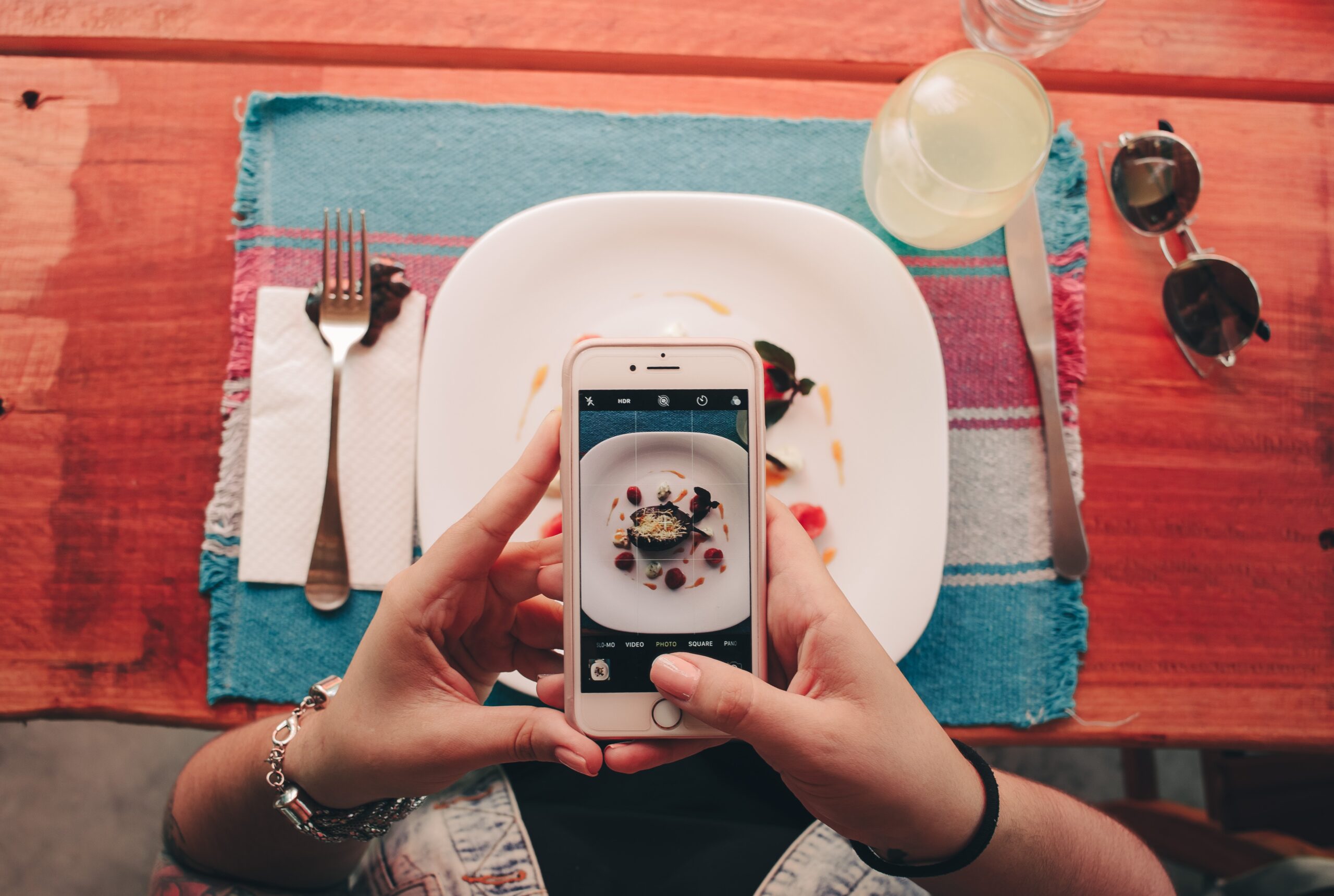Diner at Restaurant on Smartphone